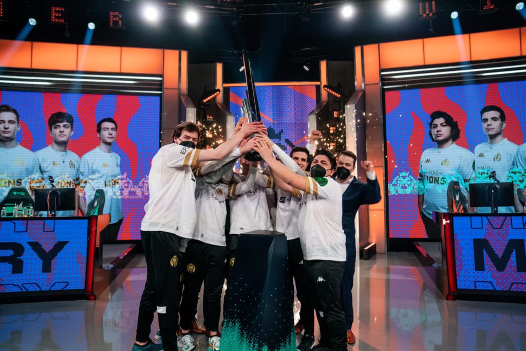 MAD Lions lift the <a href="https://esports.gg/news/league-of-legends/2022-lec-spring-split/">LEC spring split</a> trophy. Image credit: Michal Konkol/Riot Games.