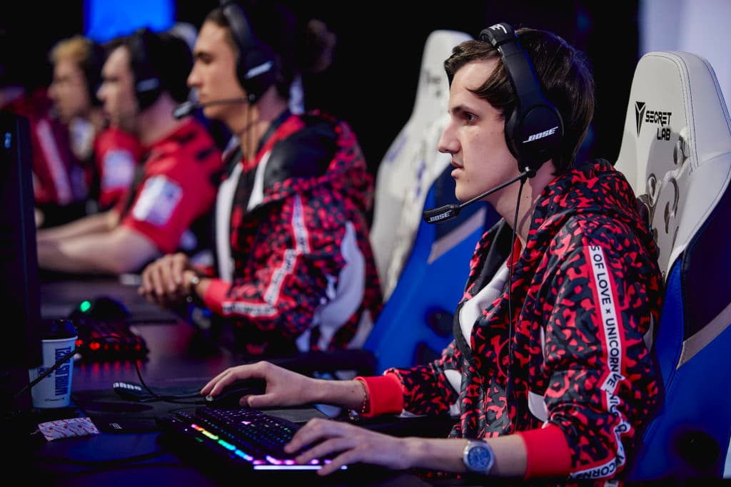 SaNTaS onstage on the first day of Worlds 2021. Argonavt is beside him. Photo via Riot Games/Getty Images.